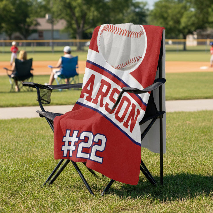 Red blanket with a baseball design and 'CARSON #22' text on a white background