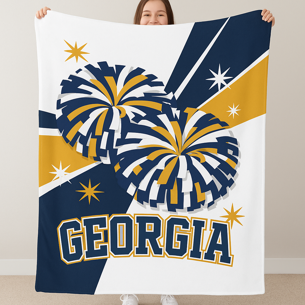 Person holding a blanket with pom-poms and 'Georgia' text