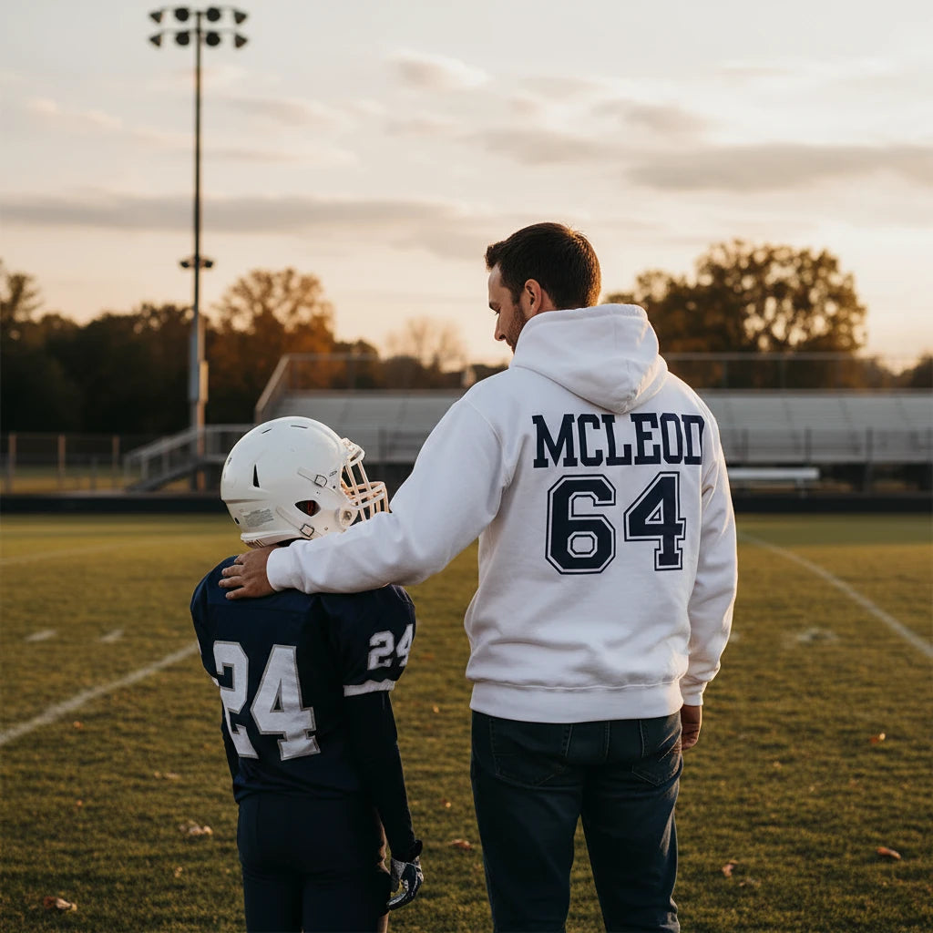 White hoodie with 'MCLEOD 64' printed on the back against a white background