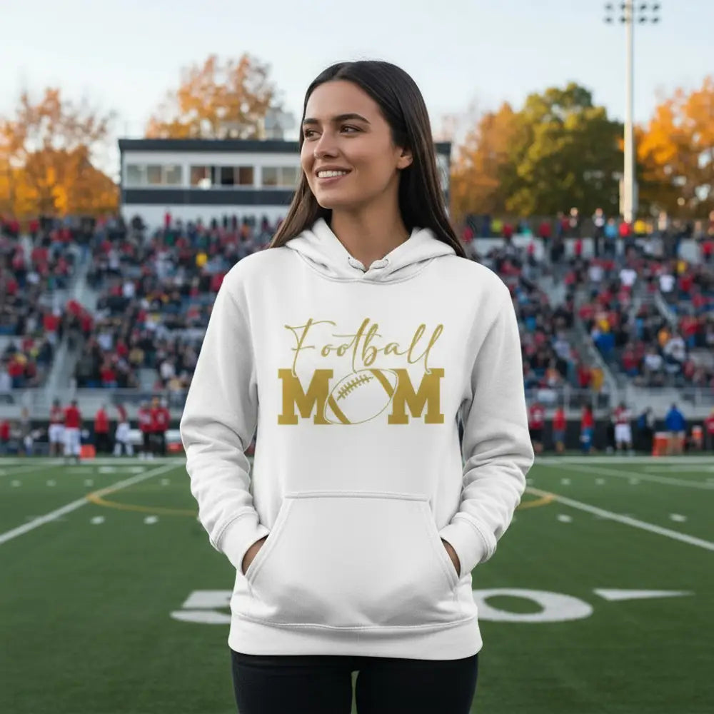 White hoodie with 'Football Mom' text in gold on a white background