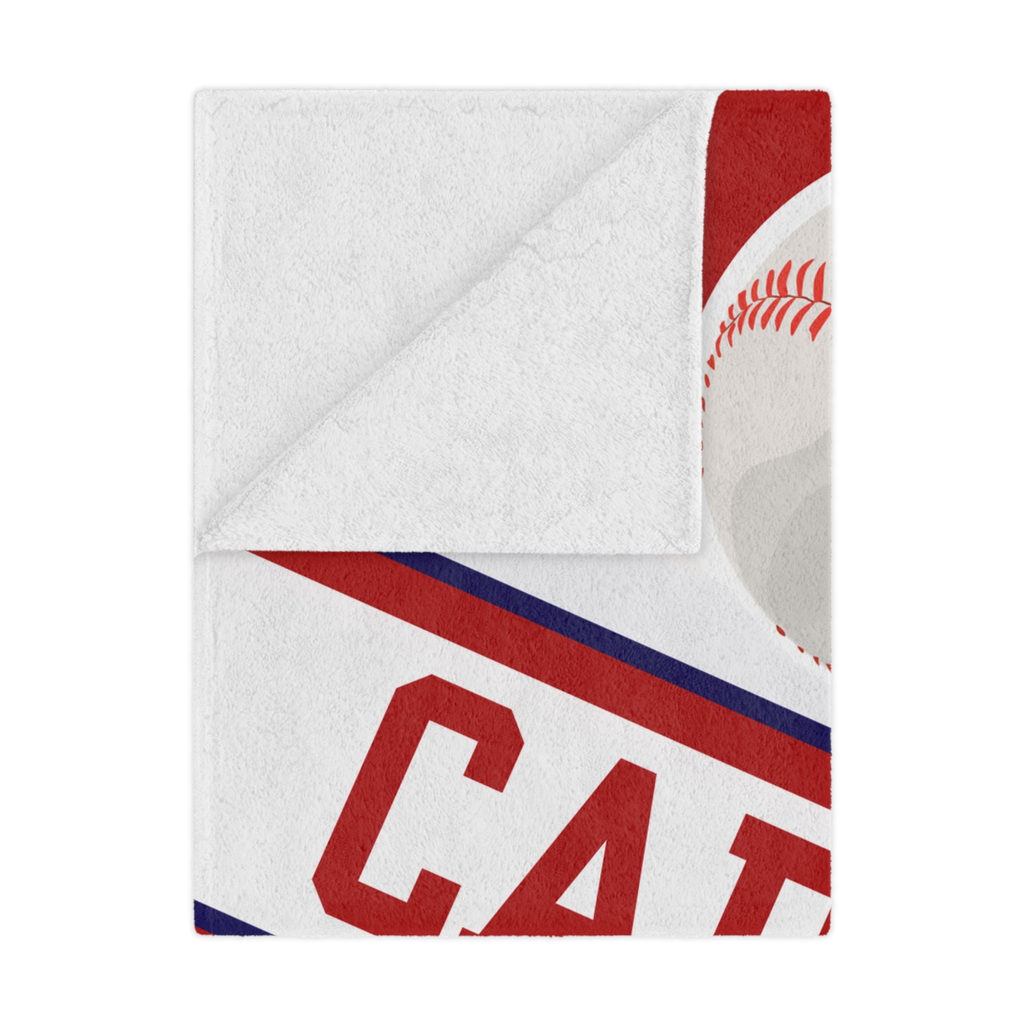 Folded blanket with red and blue design on a white background