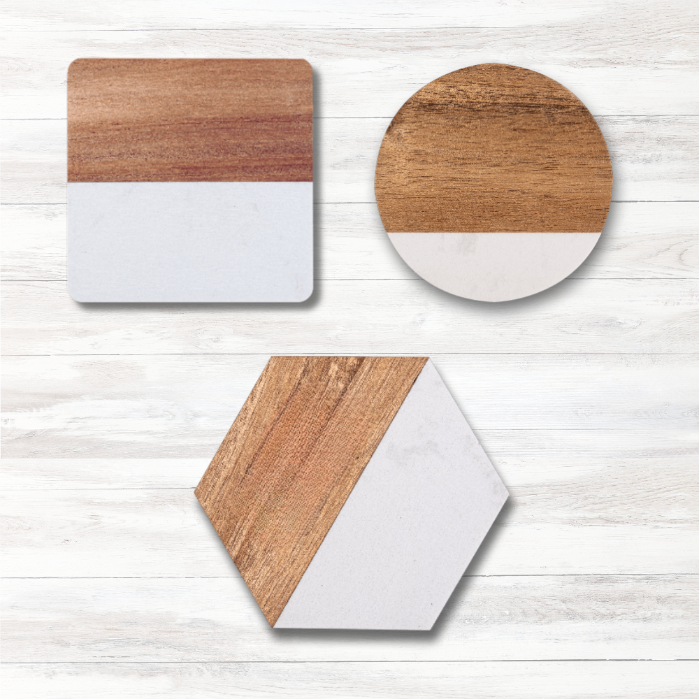 Set of geometric wooden coasters on a light wood background