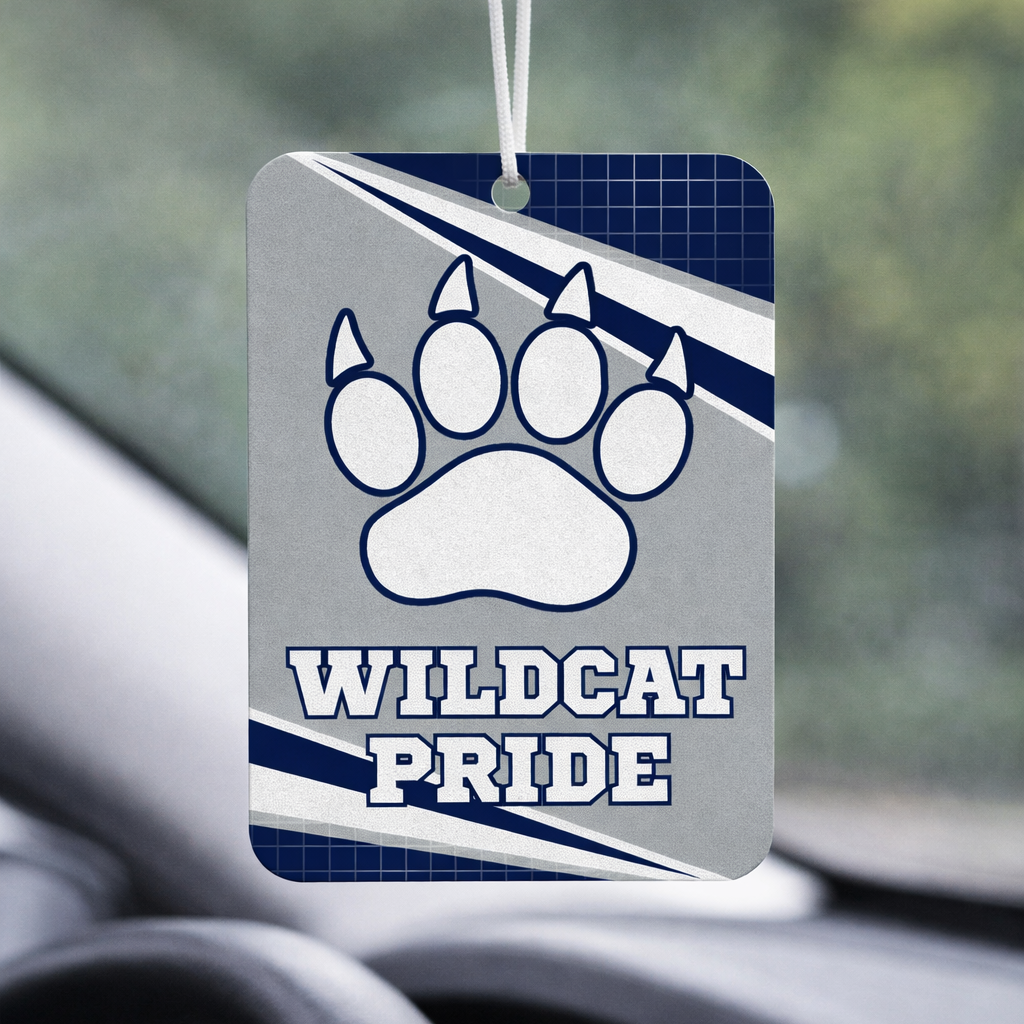 Car air freshener with a paw print design and 'Wildcat Pride' text hanging from a car's rearview mirror.