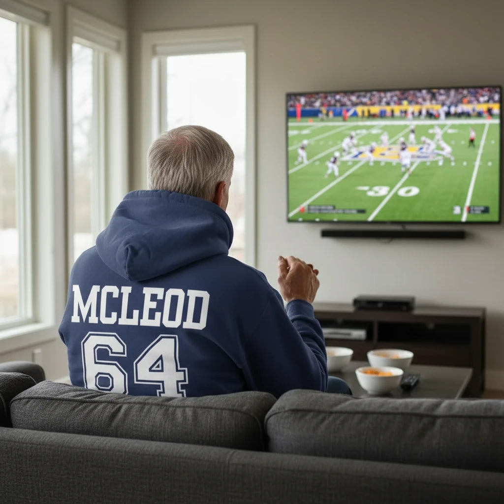 Navy blue hoodie with 'MCLEOD 64' printed on the back against a white background