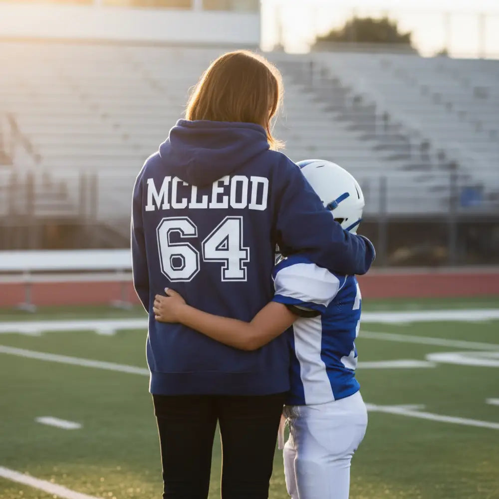 Navy blue hoodie with 'MCLEOD 64' printed on the back against a white background