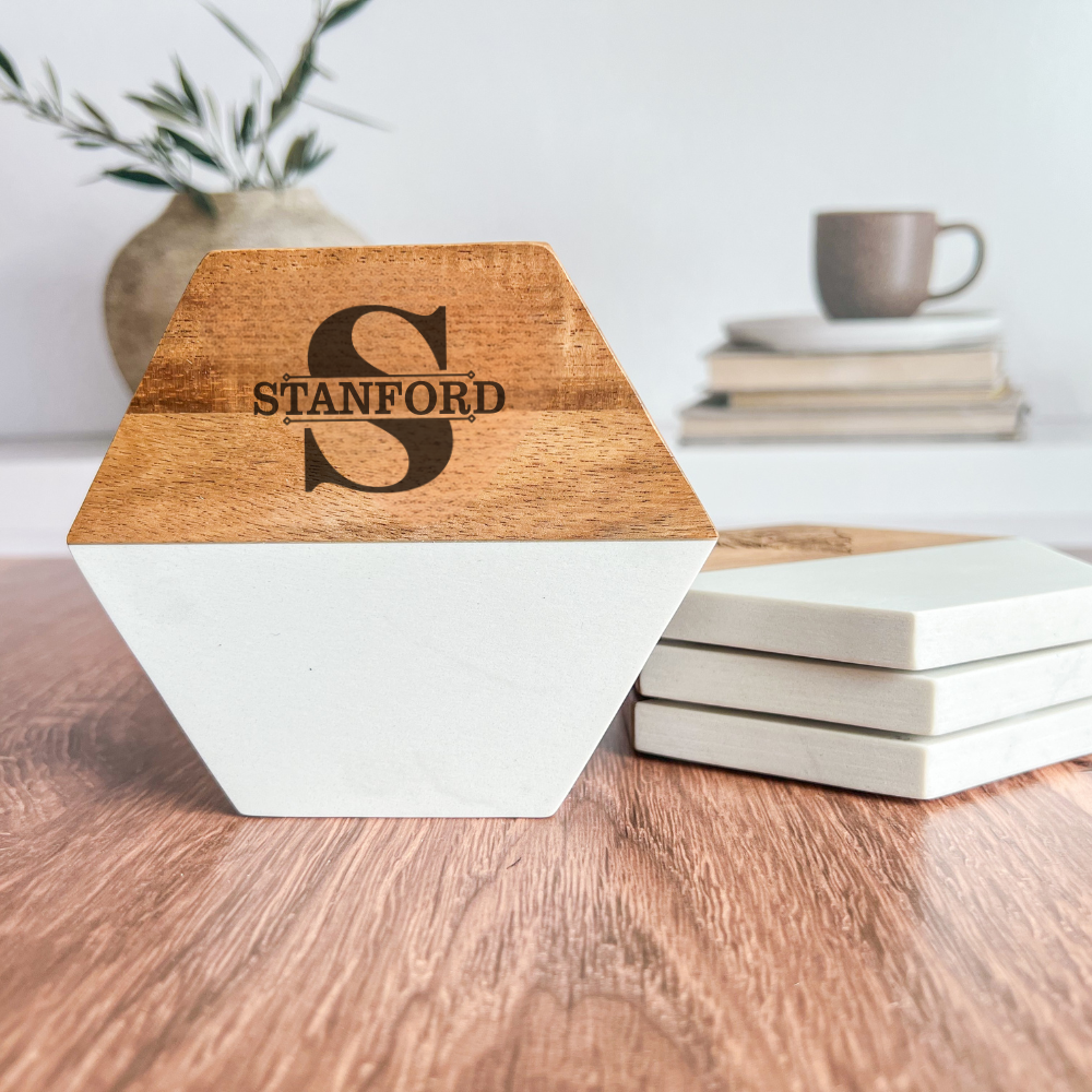 Wooden and white geometric object with 'Stanford' branding on a wooden surface.