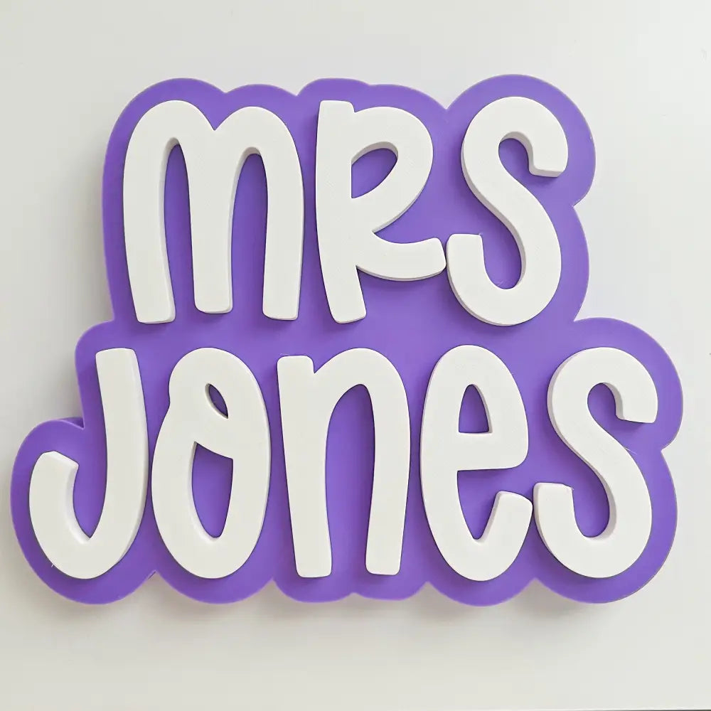 Decorative sign with 'Mrs Jones' text on a white background