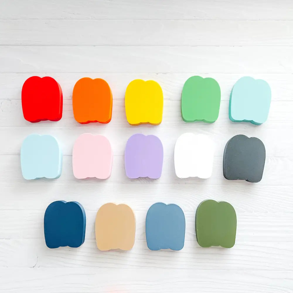 Row of colorful rectangular objects on a white background